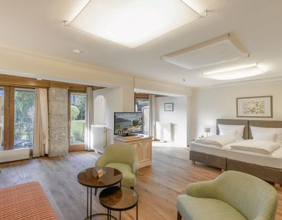 Wellnesshotel Ebner's Waldhof am See: Gartenzimmer