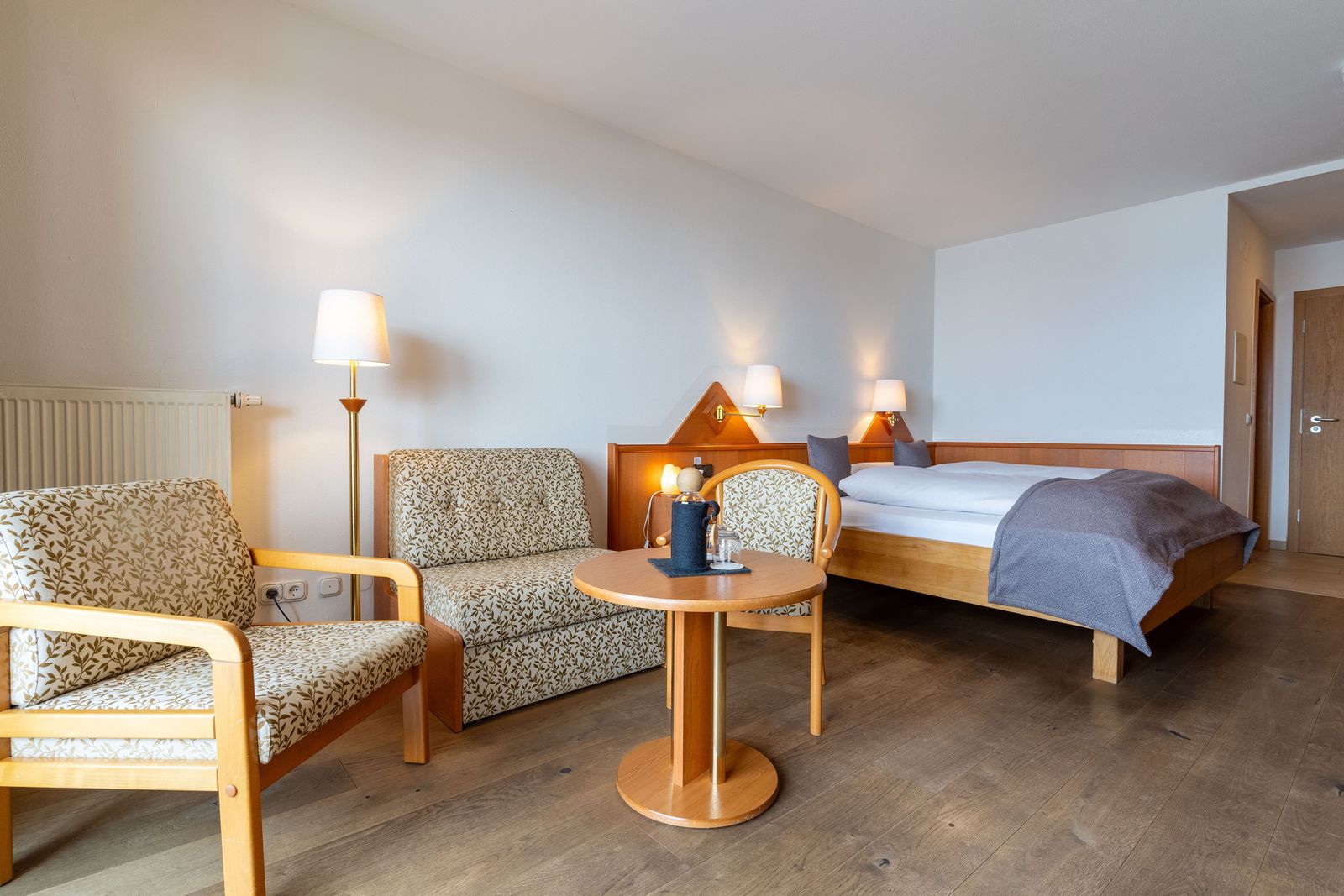 Double room south panorama with balcony and view of the mountains and Lake Hopfensee