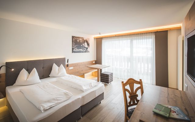 Suite con balcone| 40-50m², 2 stanze image 1 - Familotel Südtirol Alpenhof Dolomit Family