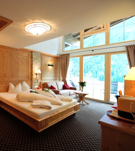 Familiensuite »Luxus Zirbe« image 1 - Familotel Stubaital Alpenhotel Kindl