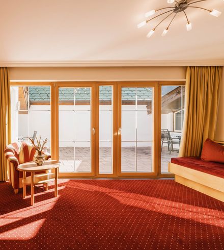 Doppelzimmer »Deluxe mit eingeschränkter Aussicht« image 1 - Familotel Stubaital Alpenhotel Kindl