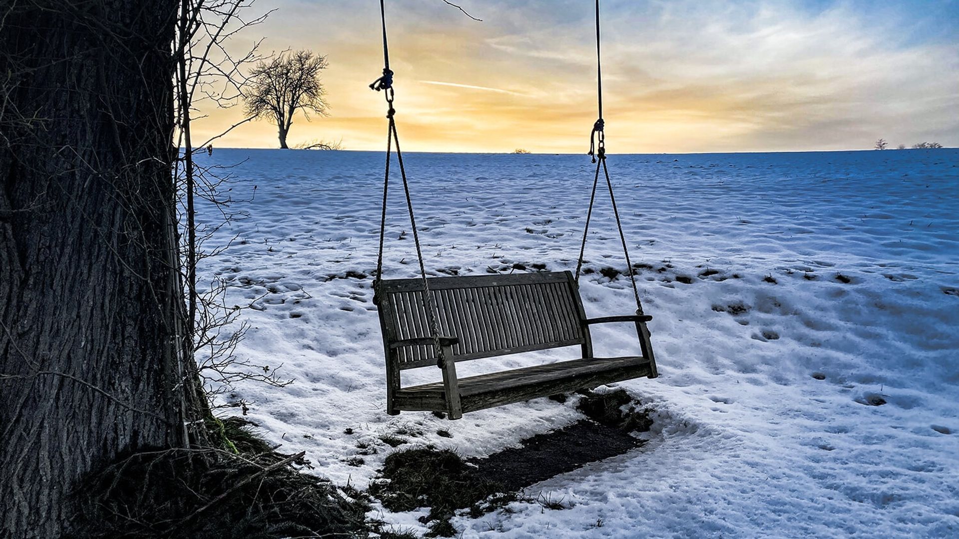 Swing in winter snow