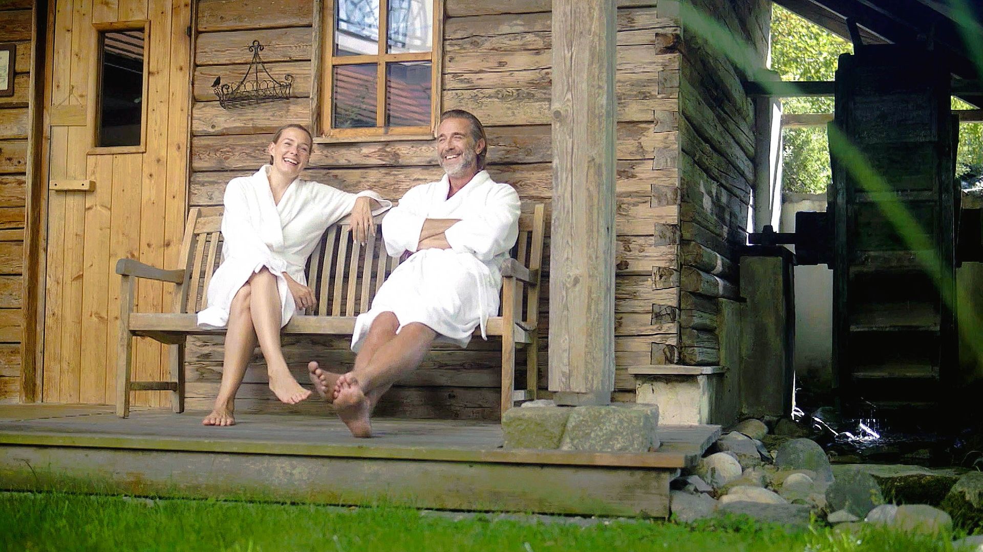 couple in front of the sauna