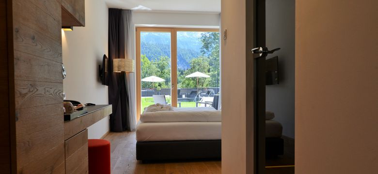 DAS GRASECK - mountain hideaway & health care: Basic room sunny side with balcony/terrace image #3