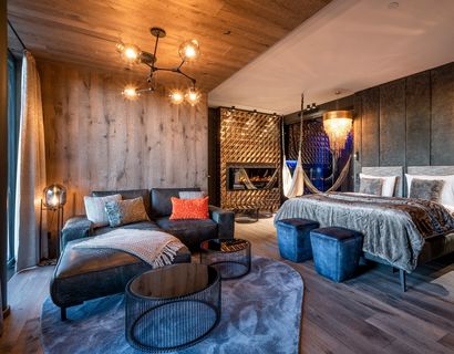 Hüttenhof - Wellnesshotel & Luxus-Bergchalets: Golden-Sky-Suite