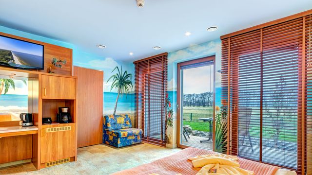 Wellnesssuite - Meereslagune mit Terrasse