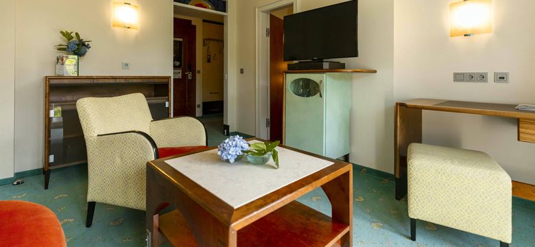 Wohnbereich in der Juniorsuite Südseeperle in NeptunsReich