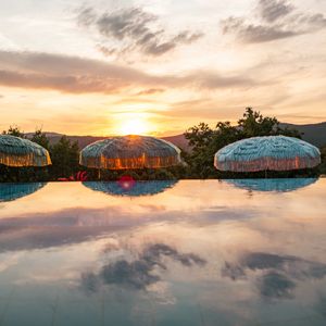 Sonnenaufgang am Dachpool