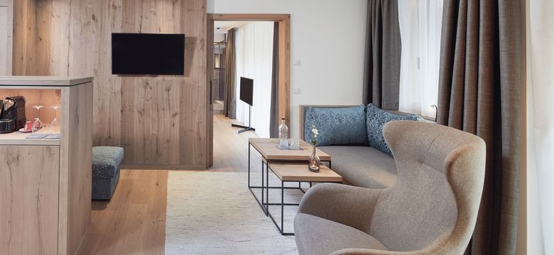 A stylish suite at the HOCHKÖNIGIN Hotel in Maria Alm – where natural wood meets modern design.Perfect for relaxing moments in the Austrian Alps.