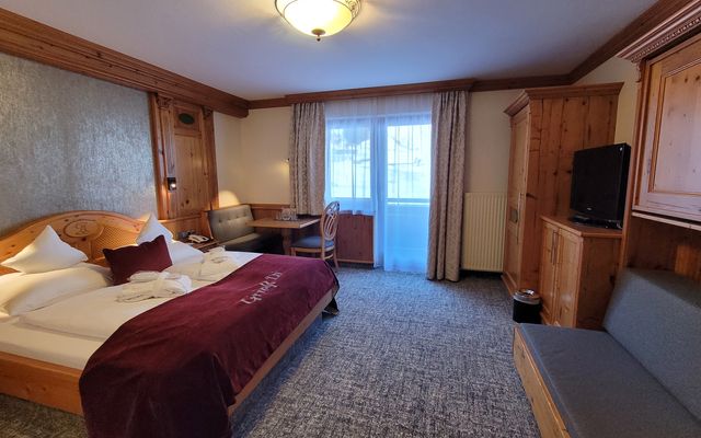 Családi szoba comfort szoba image 1 - 4 Sterne Wellnesshotel in Zauchensee Hotel Alpenrose Zauchensee