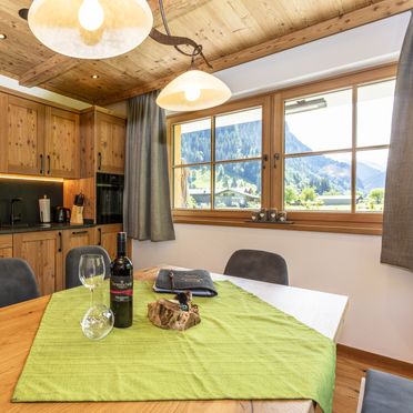 Kitchen with dining table, Raingrub Chalets, Großarl, Salzburg, Austria