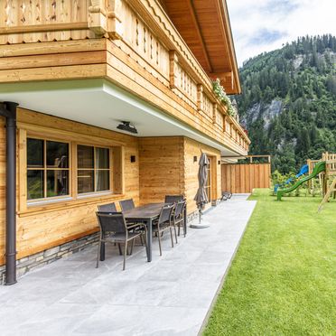 Playground with lawn, Raingrub Chalets, Großarl, Salzburg, Austria