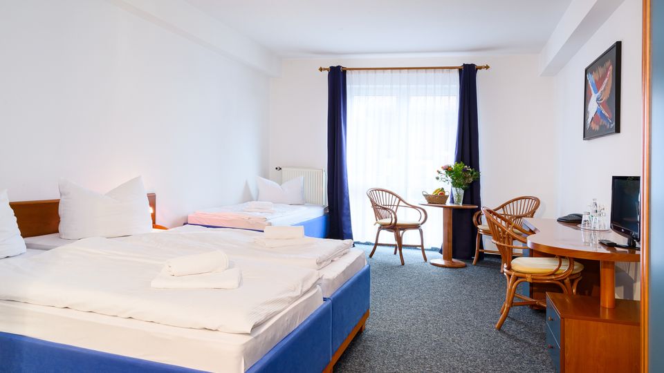 Dreibettzimmer